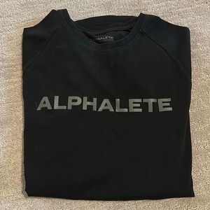 Alphalete short sleeve shirt in black, size medium